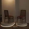 Modern Dining Chairs With Wooden Frame Rattan Backrest And Orange Cushion On White Display Stand